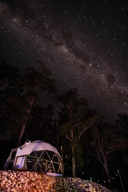 A dome under the Milky Way at night